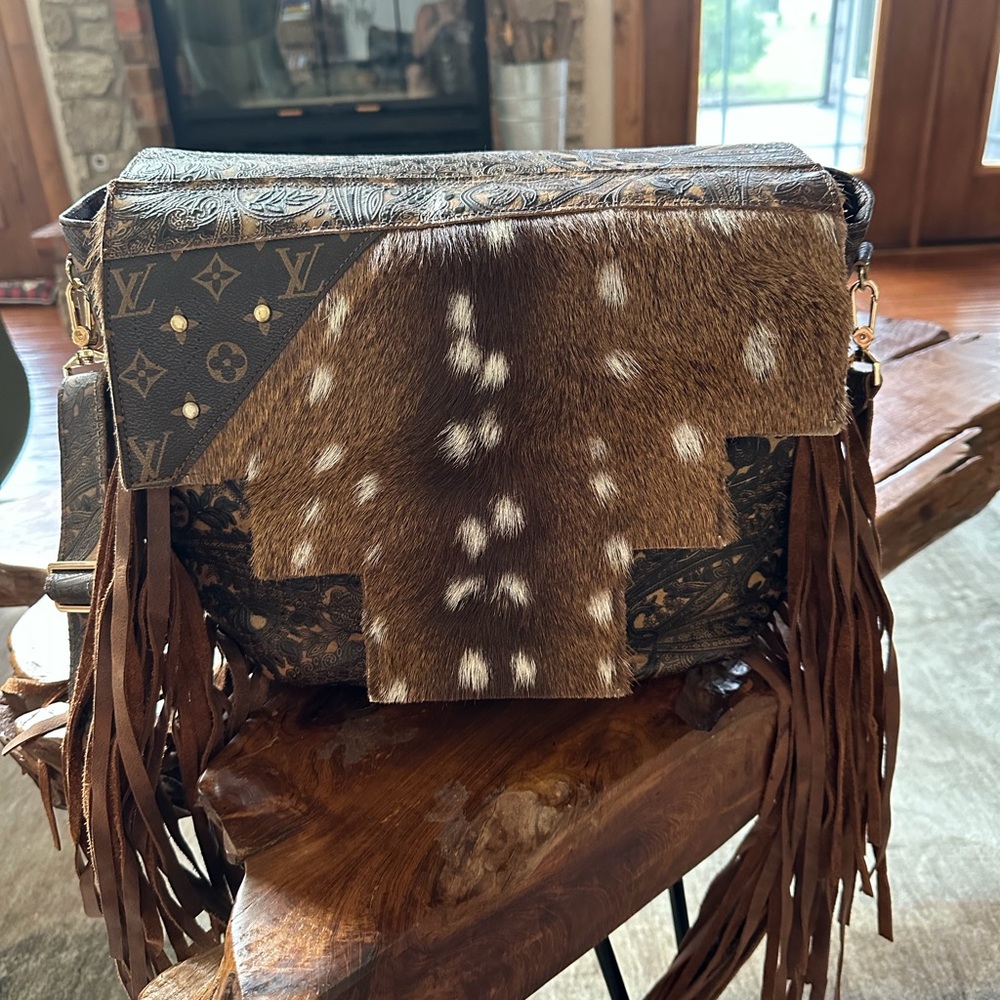 LV leather hair on hide backpack/baby bag